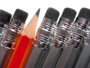 iStock_000001326396XSmall four pencil erasers and one sharpened pencil point