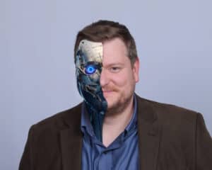 AI Thomas, a portrait of Thomas Umstattd Jr. with half of his face replaced by a robot's.